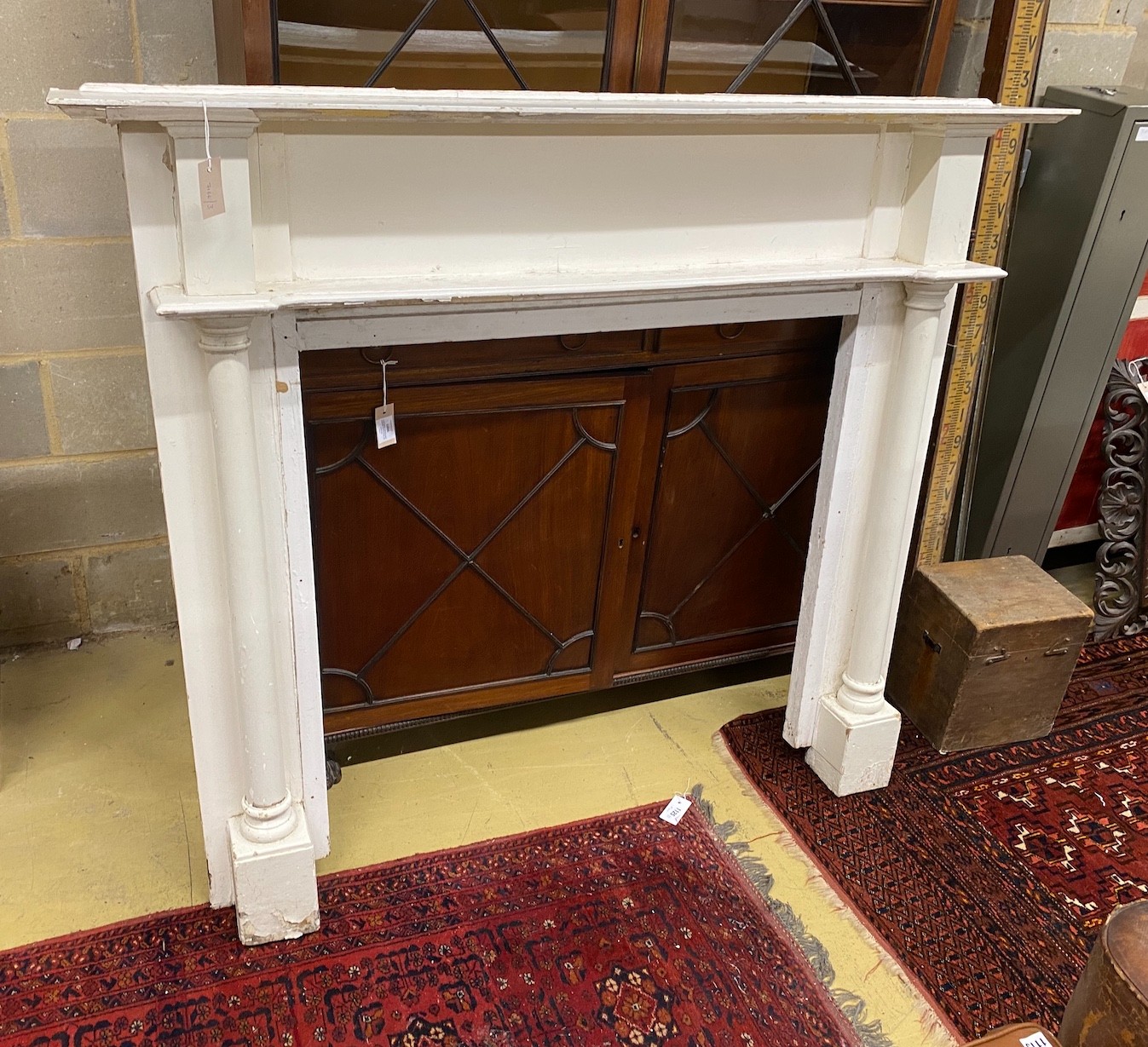 A Victorian painted pine fire surround, width 151cm, height 130cm, aperture width 95cm, height 95cm